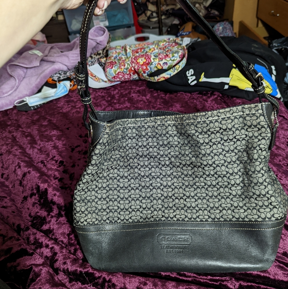Gray and black logo coach bucket style purse
